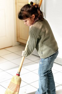 girl sweeping