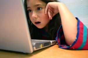 child at laptop